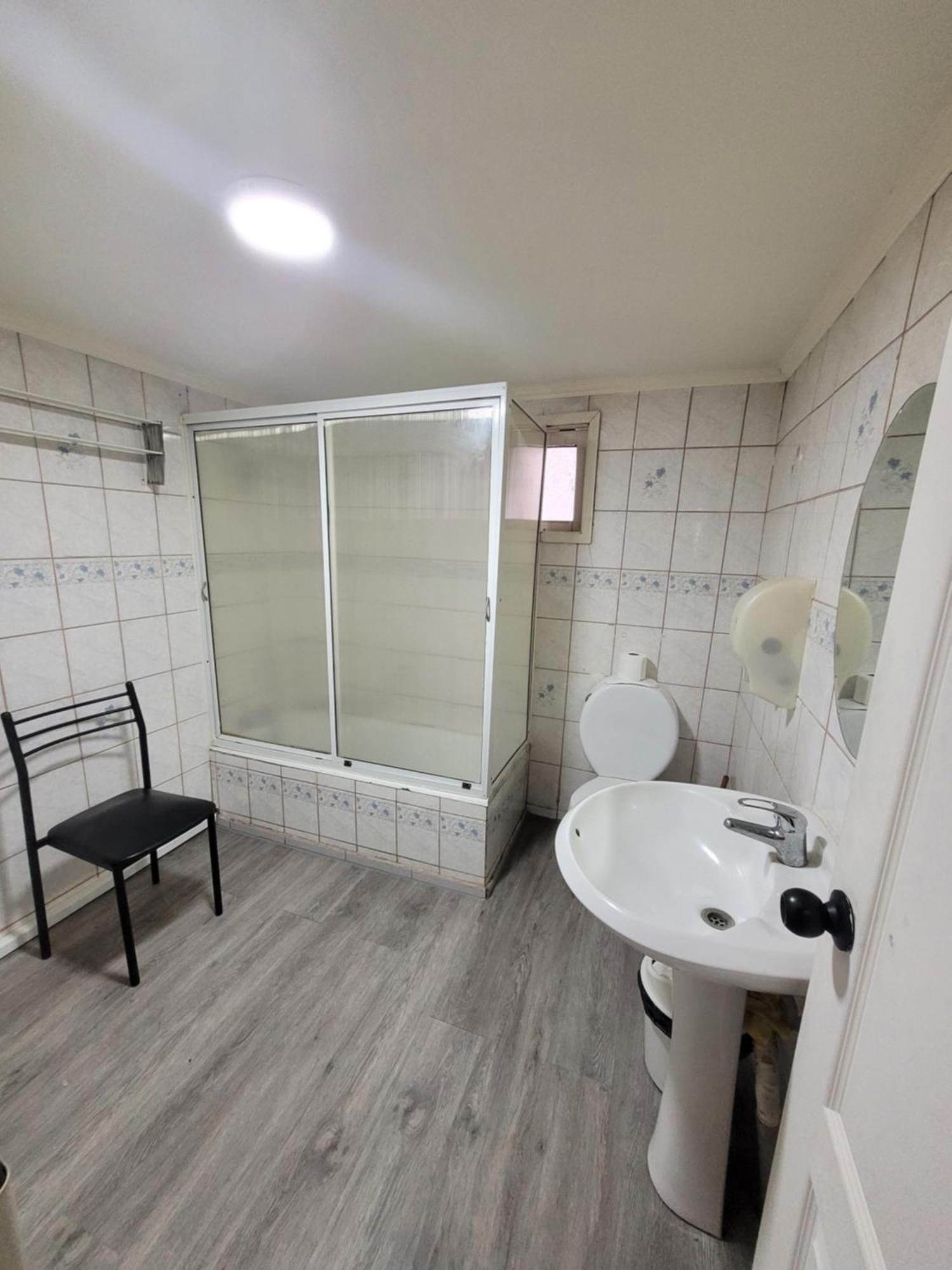 Hostal Traveltour El Campesino Puerto Natales Esterno foto