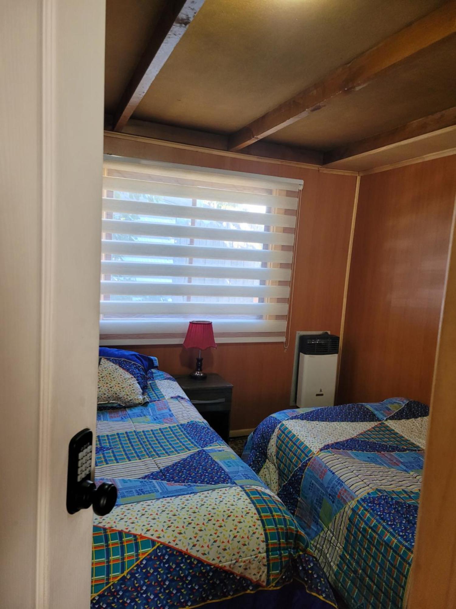 Hostal Traveltour El Campesino Puerto Natales Esterno foto